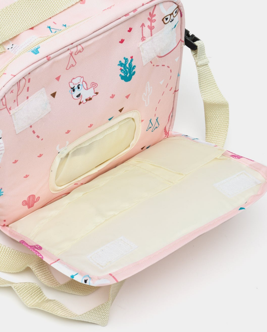 pink baby diaper bag with a llama and cactus print