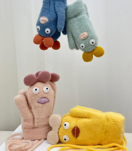 Children's knitted mittens with a cartoon design.