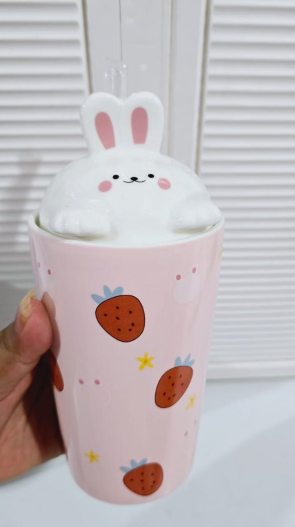ceramic storage jar with a bunny-shaped lid