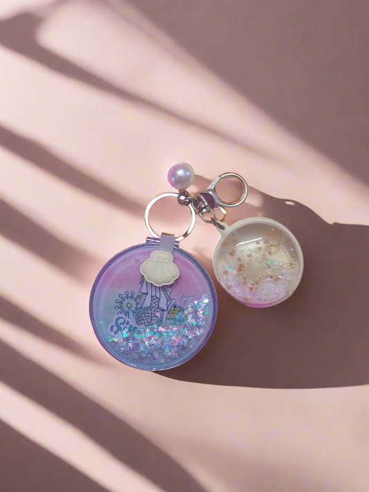 Glitter filled mirror with charms