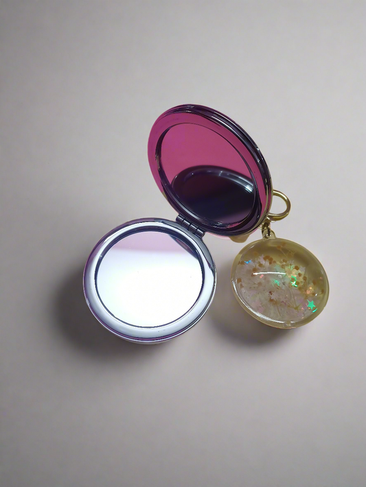 Glitter filled mirror with charms