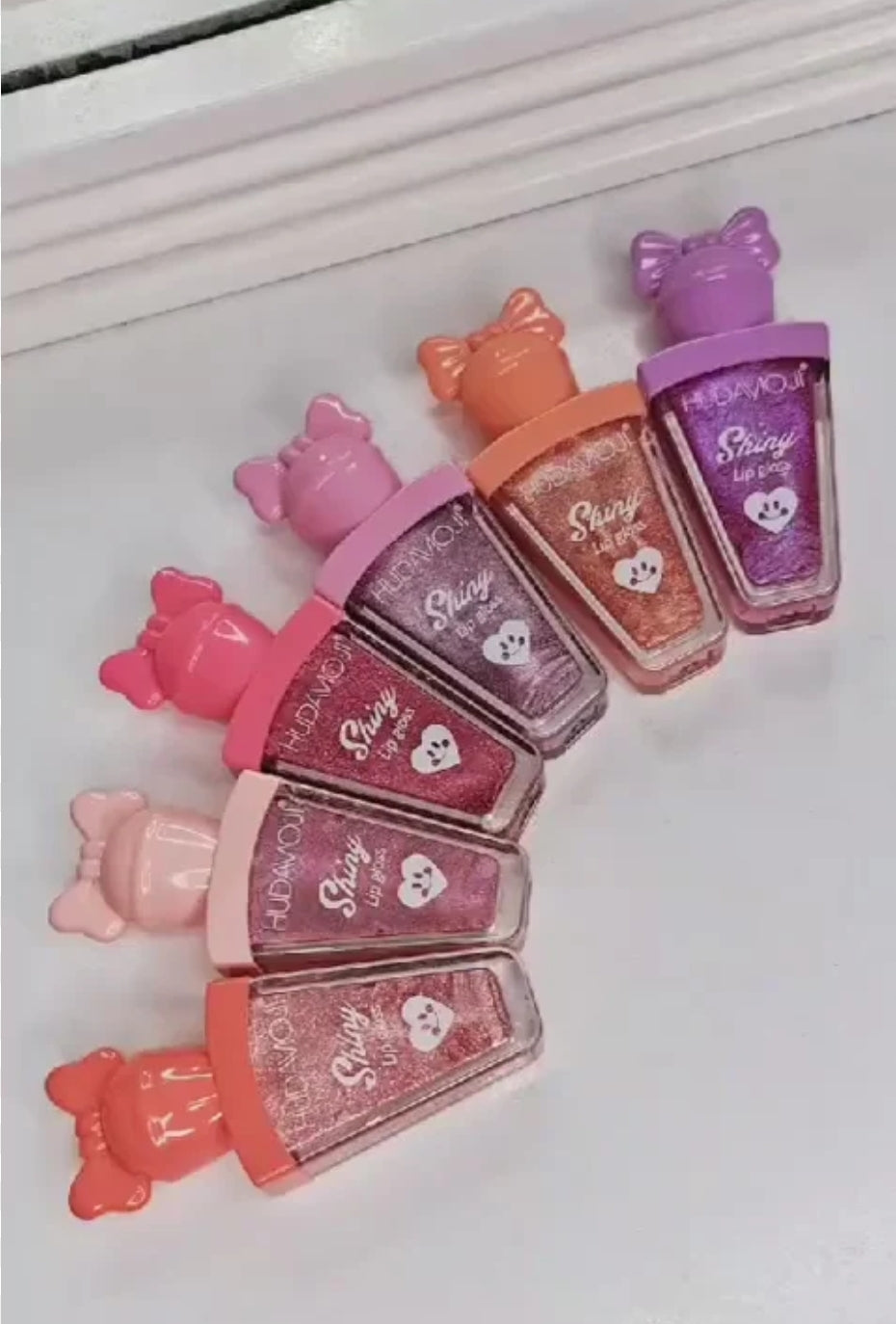 HudaMoji Shinny Lip gloss