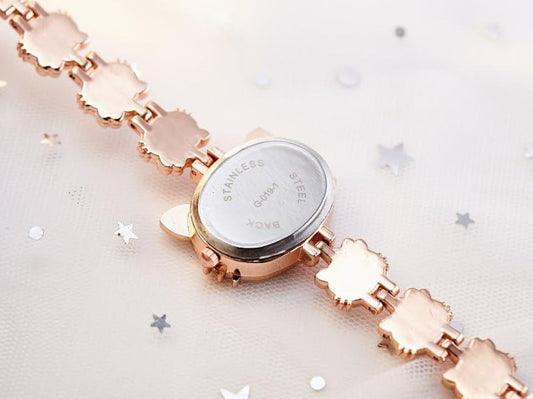 Premium Stainless steel Hello Kitty watch with a pink and gold-colored bracelet.